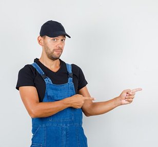 Door hardware replacement Pleasantville NY man pointing to the left side