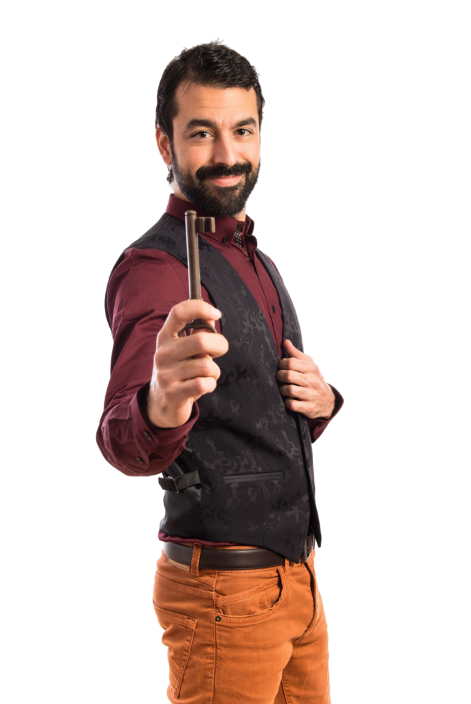 man wearing waistcoat holding vintage key
