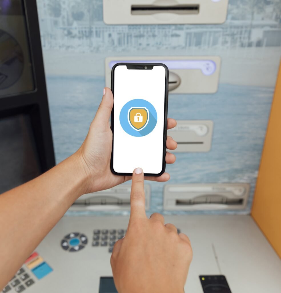 hand holding a phone with shield lock display