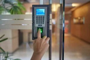 hand touching a finger print smart lock