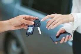 is it cheaper to go to a locksmith or dealer today hand of a woman and a man