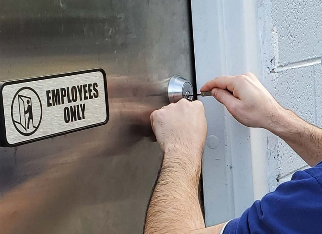 locksmith opening the employees office