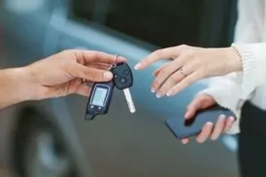 is it cheaper to go to a locksmith or dealer today hand of a woman and a man