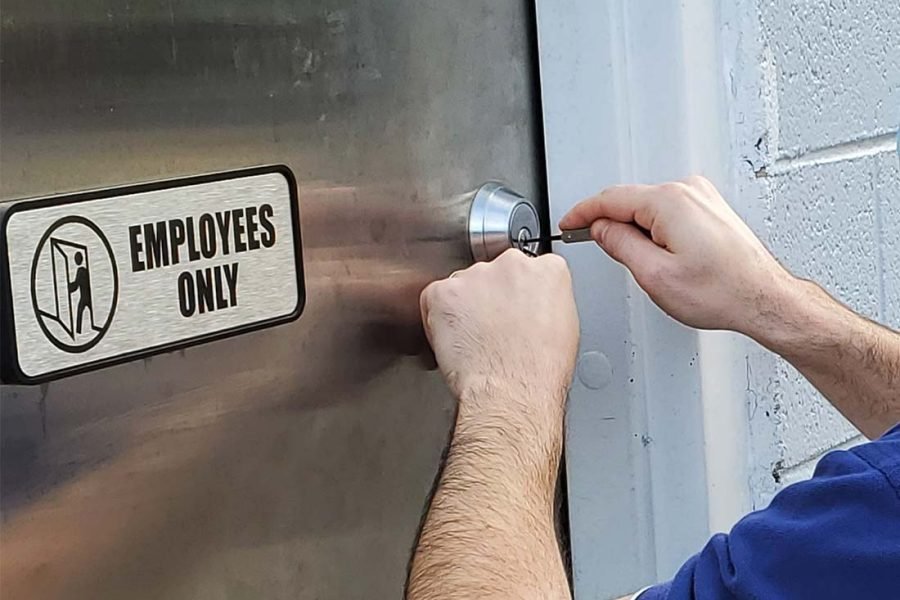 locksmith opening the employees office